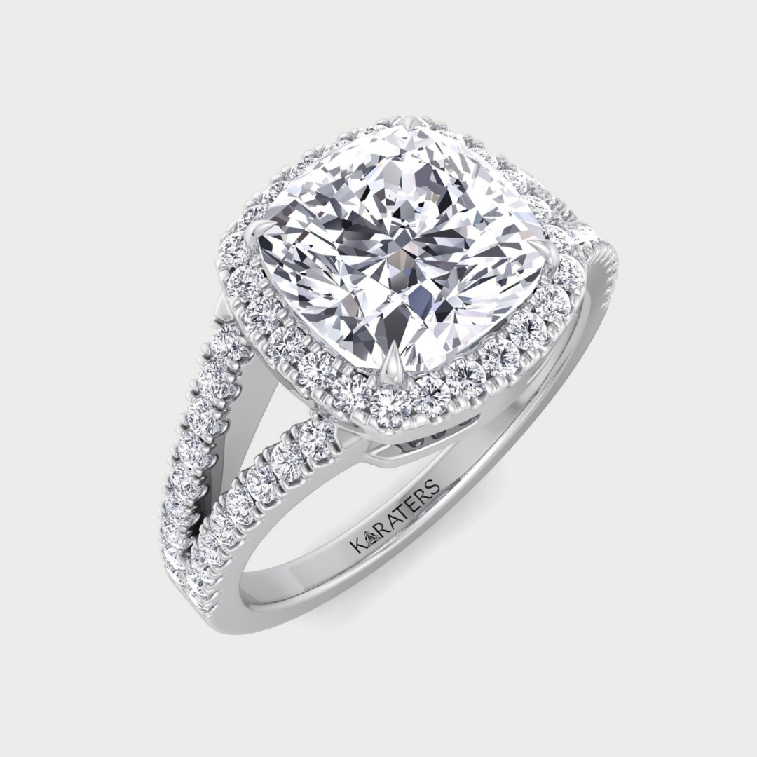 Cushion-cut lab-grown diamond halo engagement ring with split pave band.