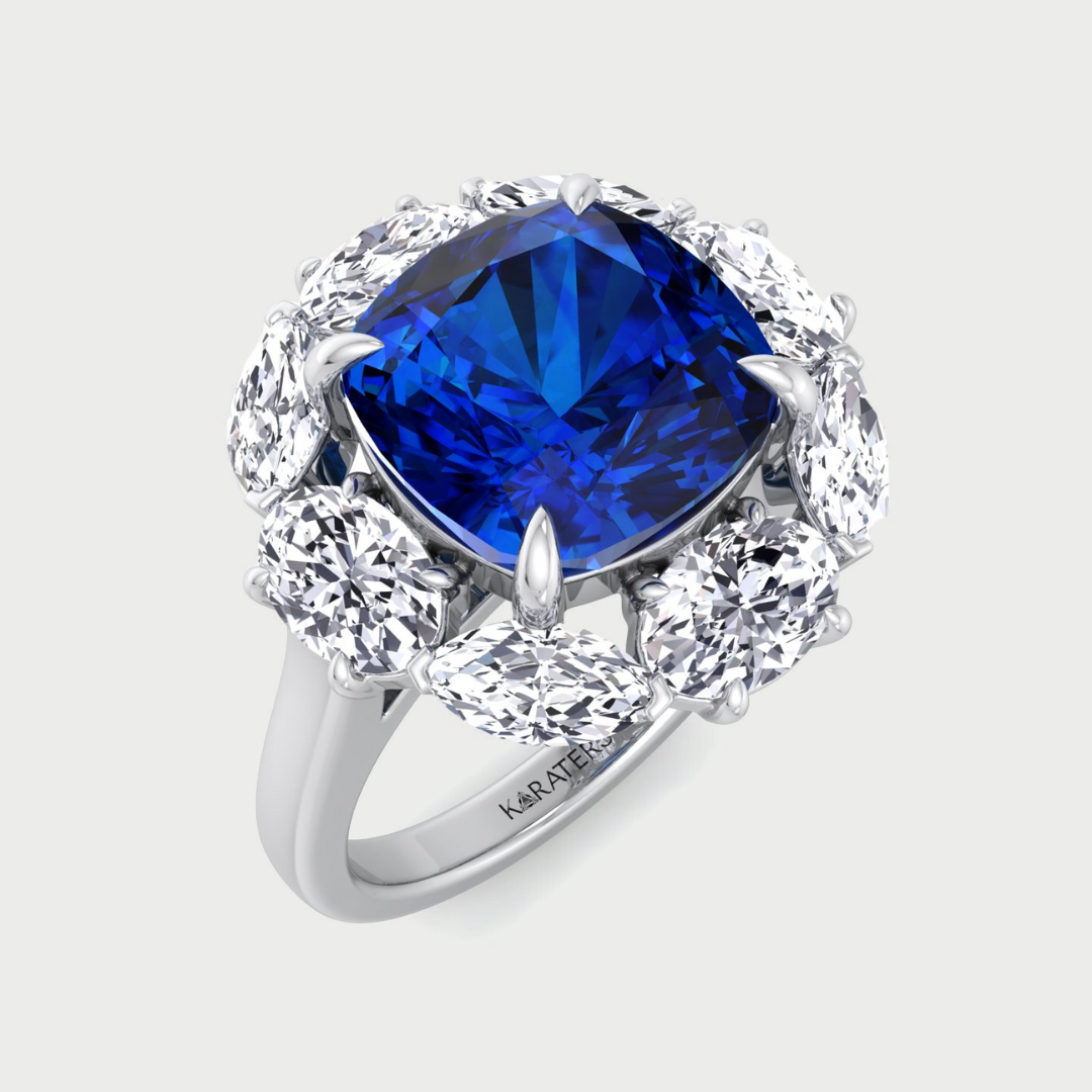 Ring with a blue gemstone and diamond-like stones on a light gray background