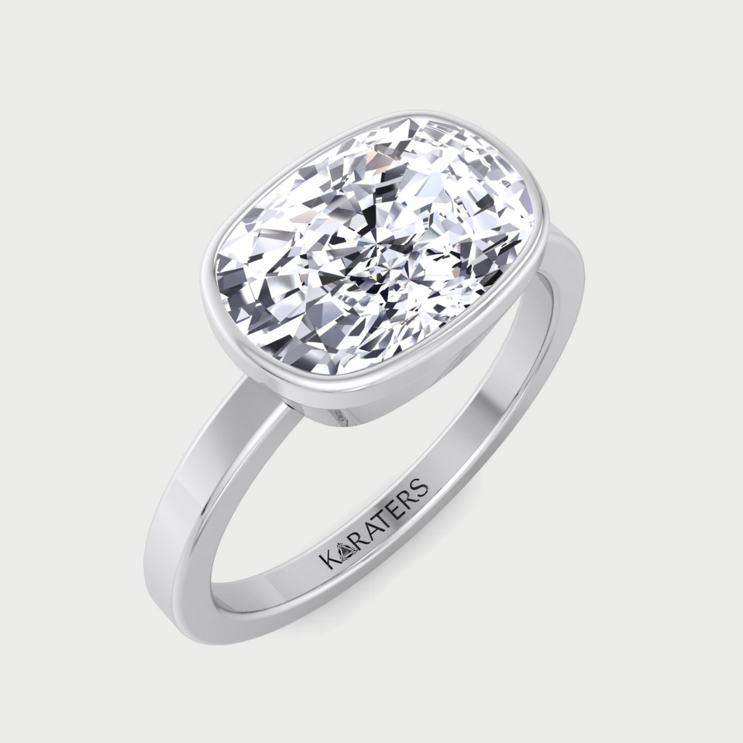 Silver ring with a large diamond on a light gray background