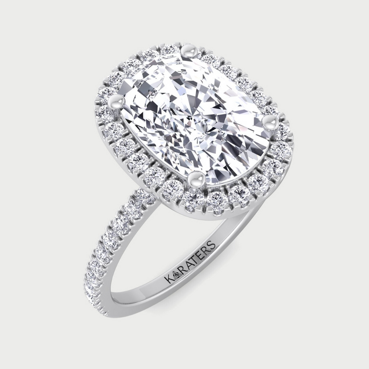 Elongated cushion cut halo lab-grown diamond engagement ring with side stones