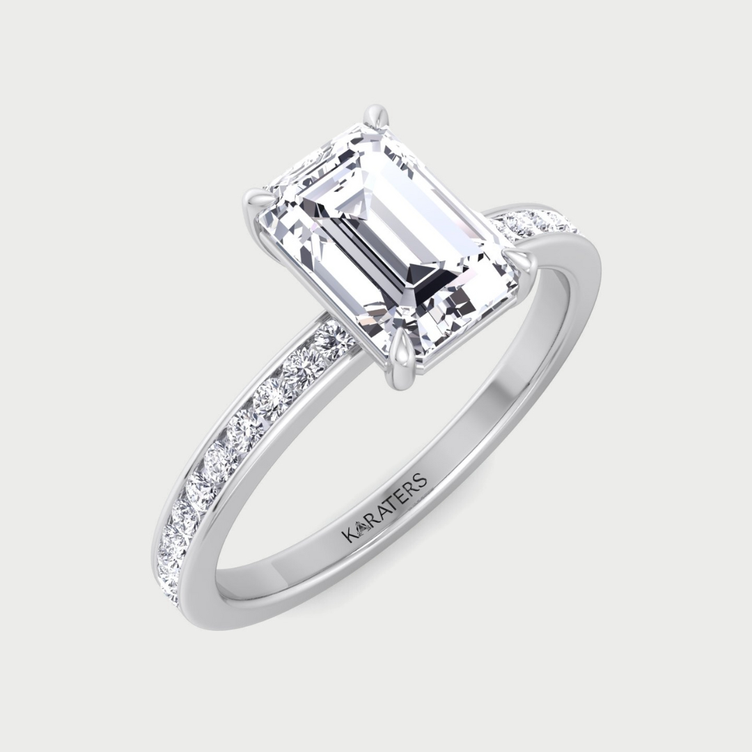 Emerald shape lab grown diamond engagement ring with channel set side stones in 14K white gold