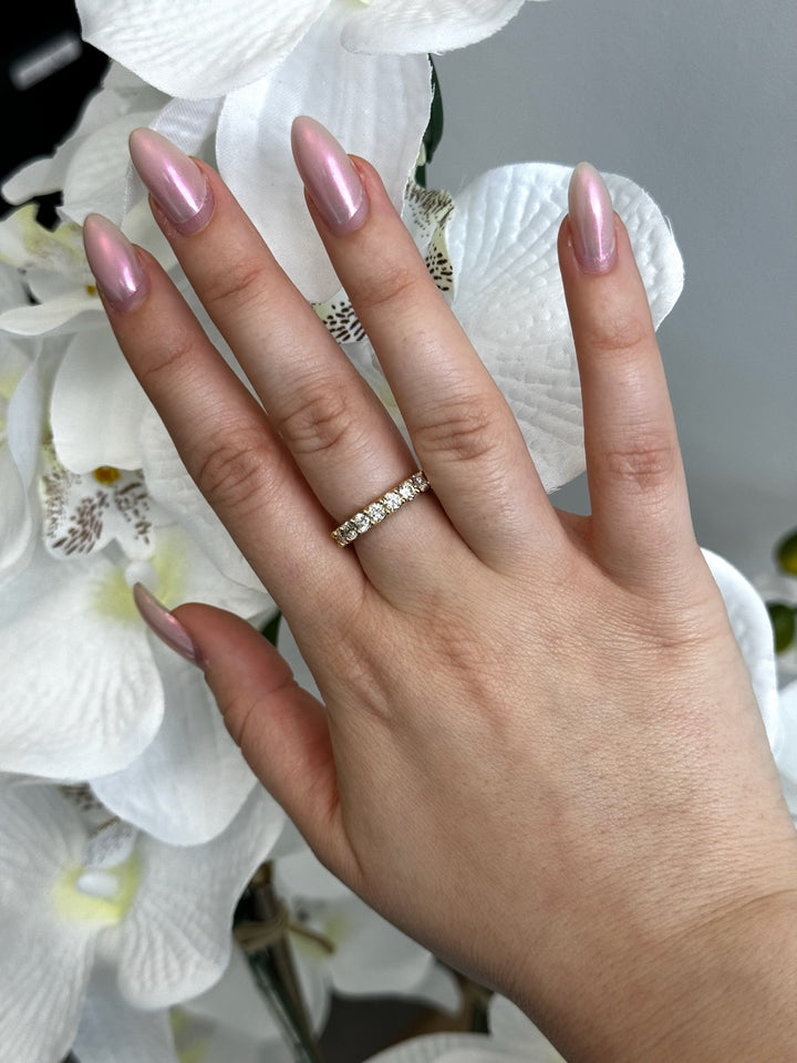 Guernica - Round Cut Lab Yellow Gold Diamond - U Prong Eternity Band, Female Hand