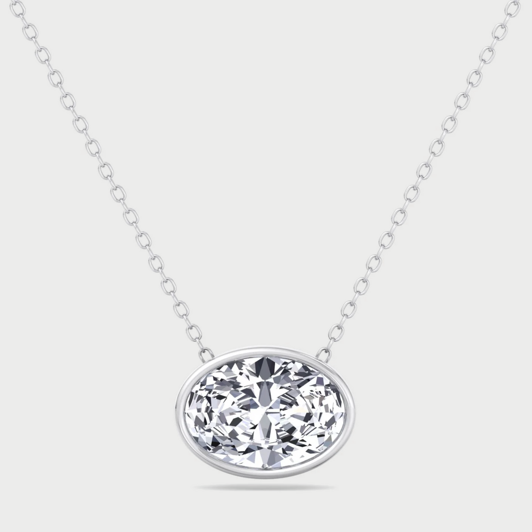 Diamond necklace on a light gray background