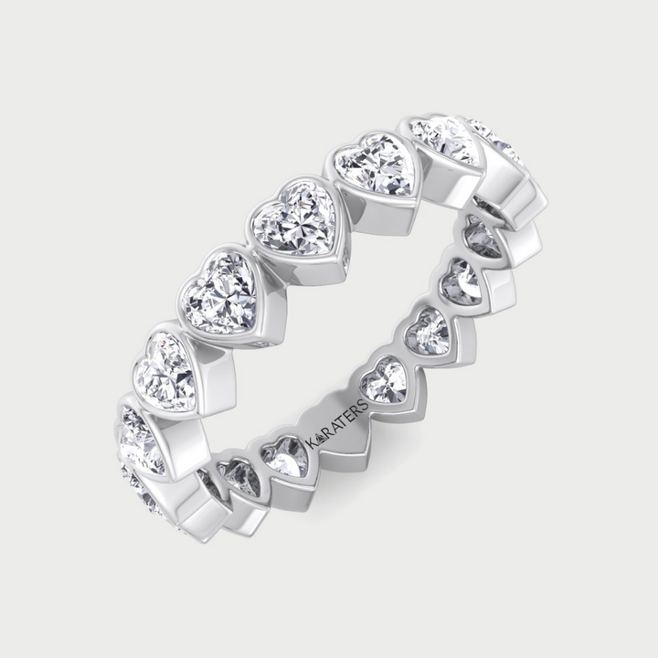 Bezel set heart shape lab-grown diamond eternity band in 14K rose gold, HEB292