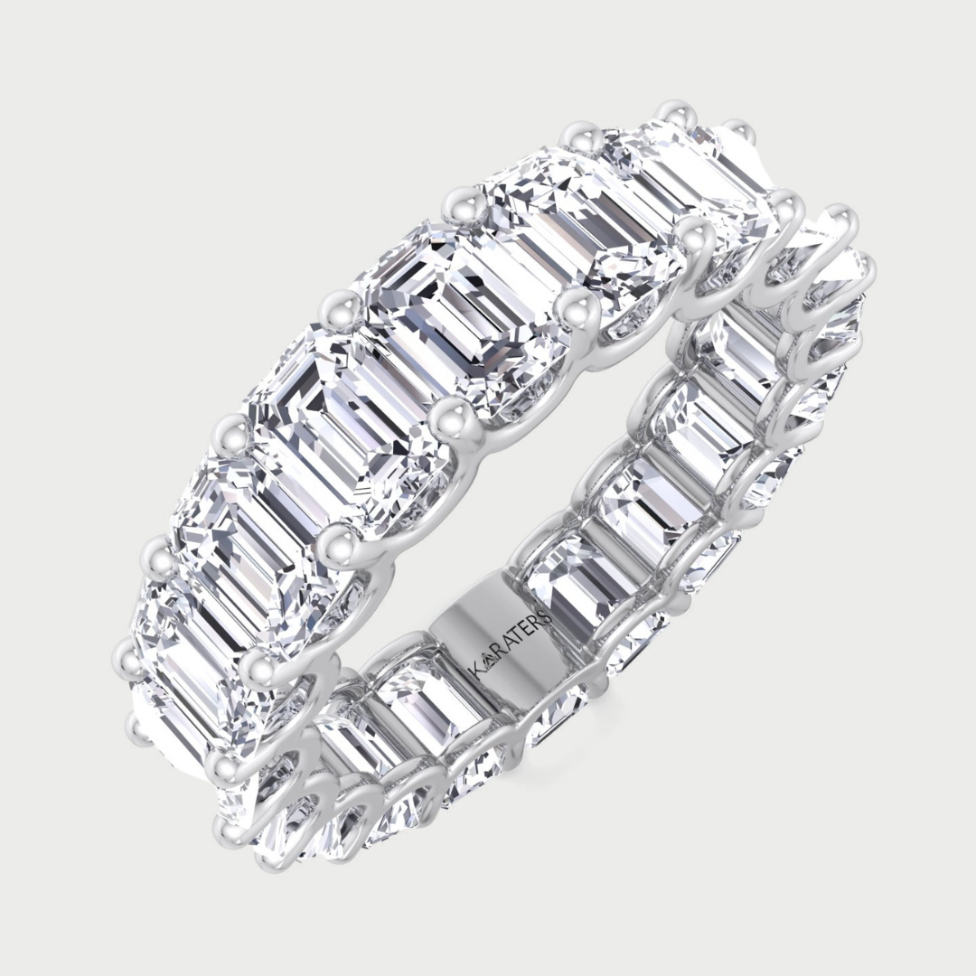 Emerald cut lab grown diamond eternity band in white gold.