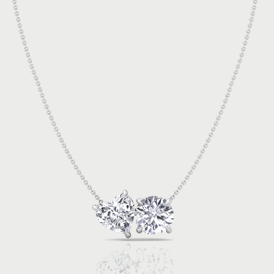 Diamond necklace on a light gray background