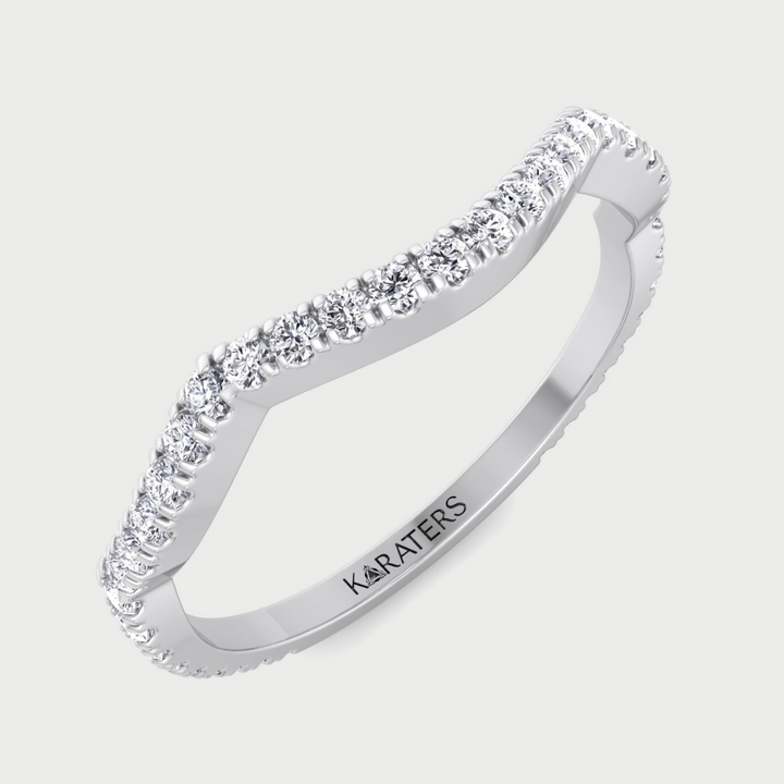 Platinum curved lab-grown diamond wedding band.