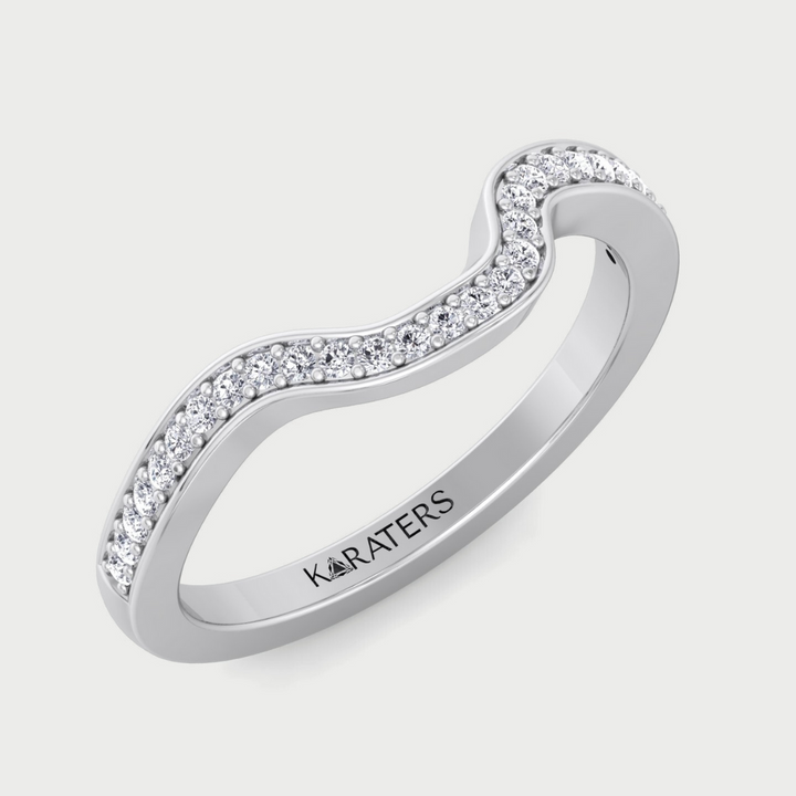 Silver ring with diamond accents on a light gray background, branded 'KARATERS'.