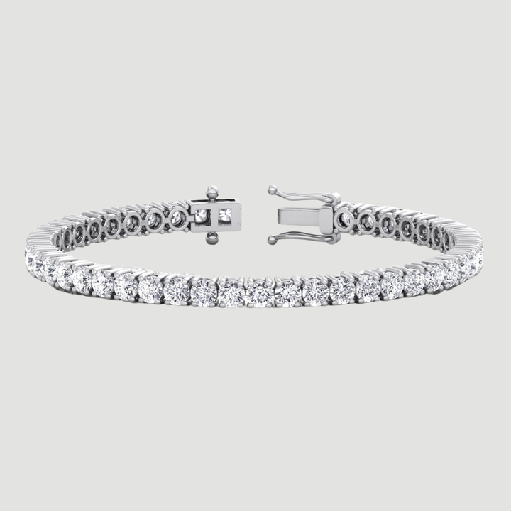 3 carat round cut lab grown diamond tennis bracelet in 14K solid gold with four prong settings by Karaters