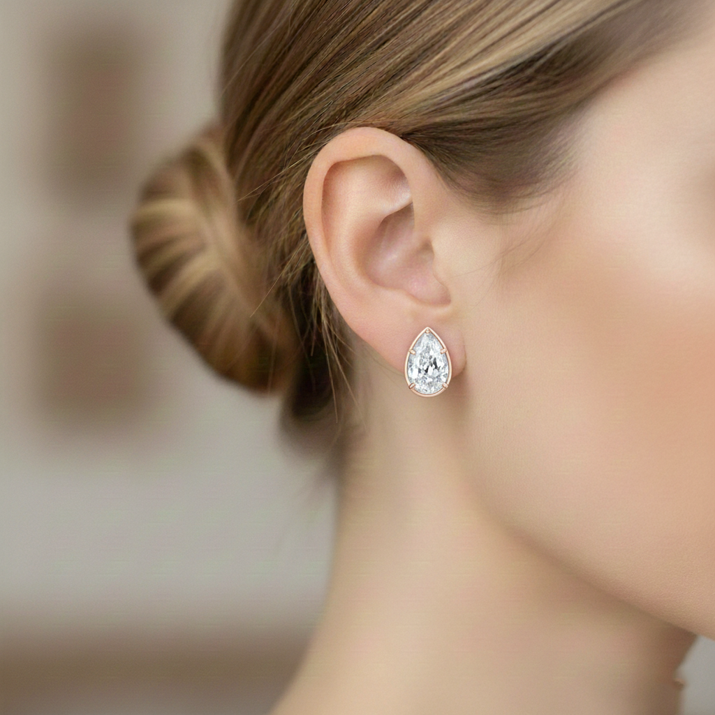 Prong Bezel Set Pear Shape Lab Grown Diamond Studs Rose Gold