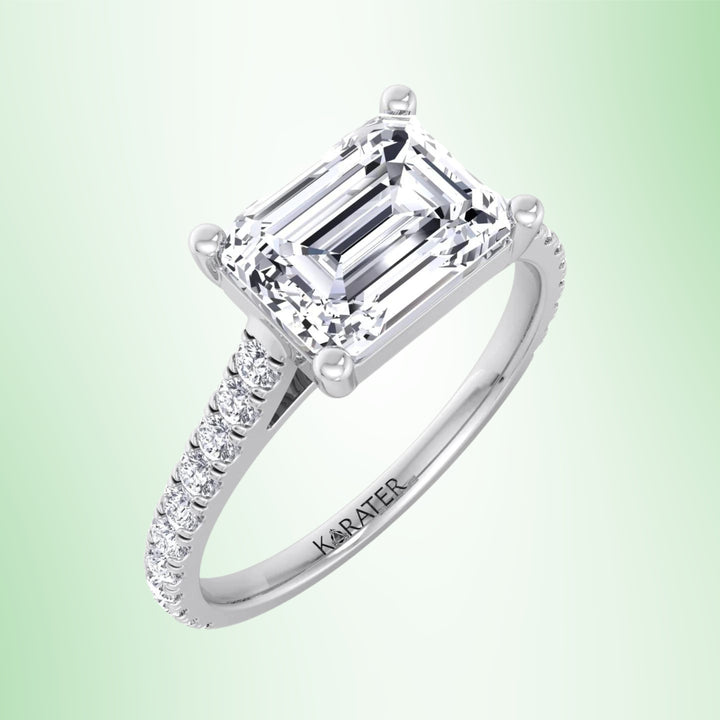 East To West Emerald Lab Diamond Engagement Ring With Side Stones