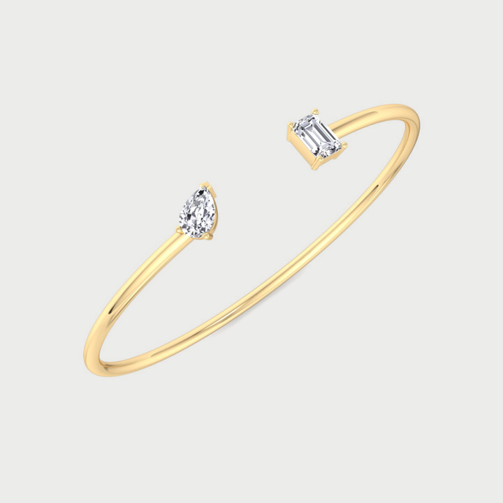 Flexible Gold Toi Et Moi Bangle with Pear & Emerald Shape Lab Grown Diamonds