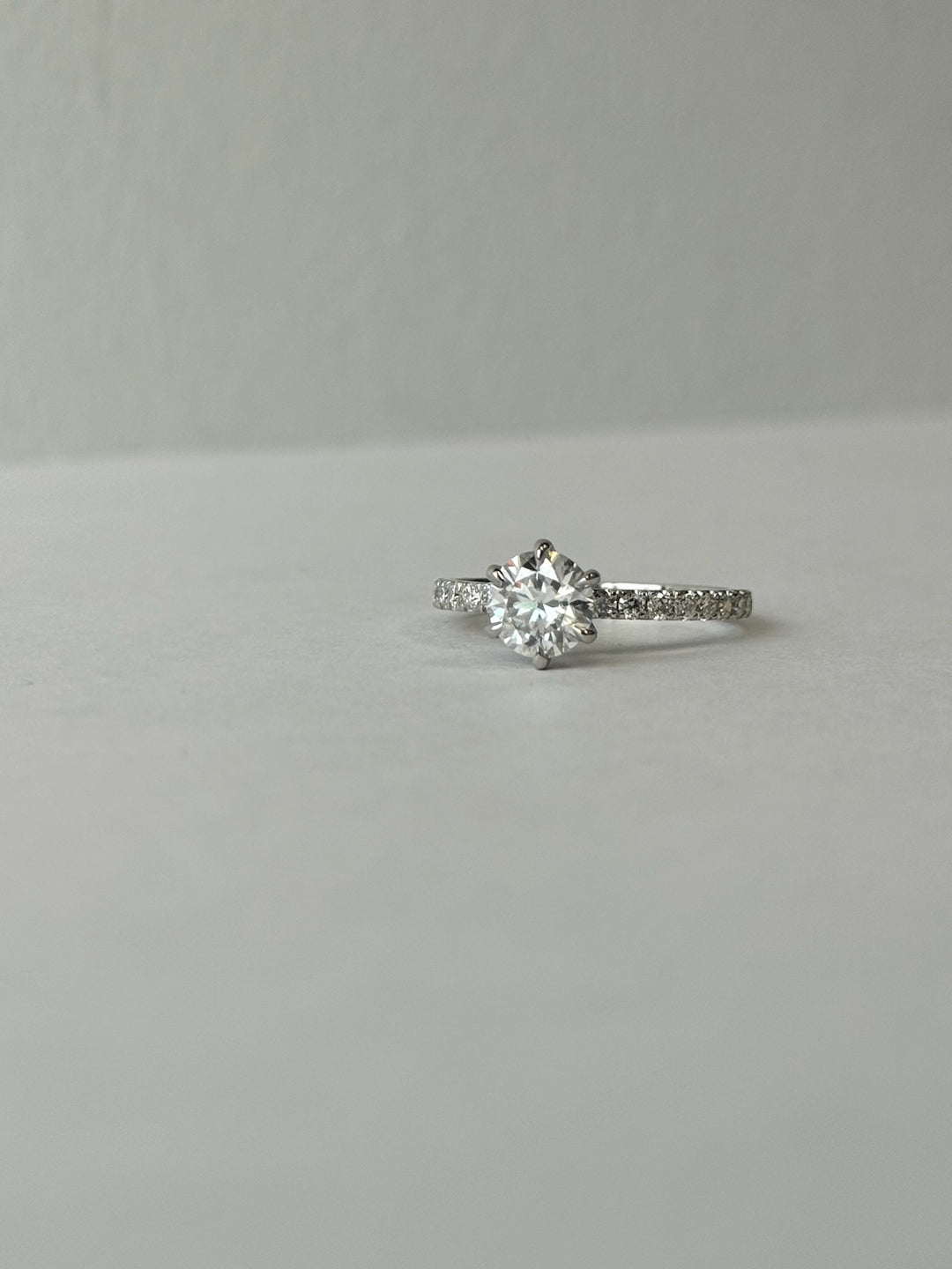 Six Prong Round Cut Lab Grown Diamond Engagement Ring With Pave Band