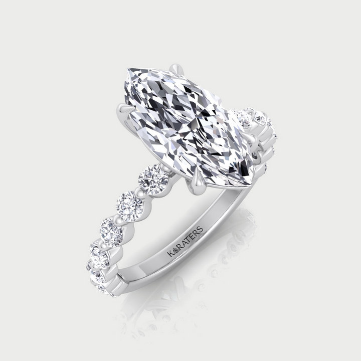 Marquise Shape Lab Grown Diamond Engagement Ring with Round Single Prong Side Stones
