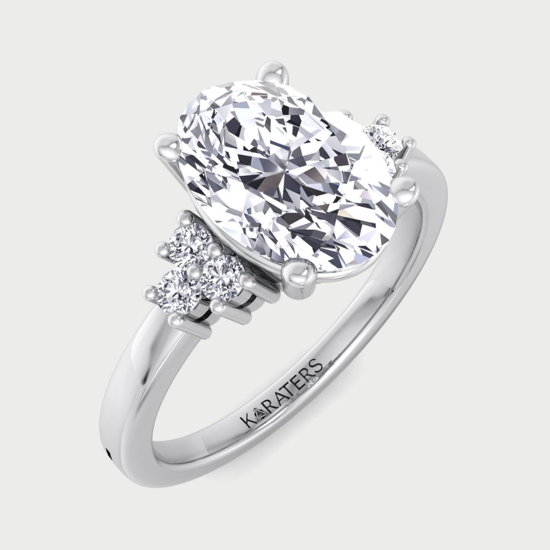 Oval Cut Solitaire Engagement Ring with Emerald SideStones