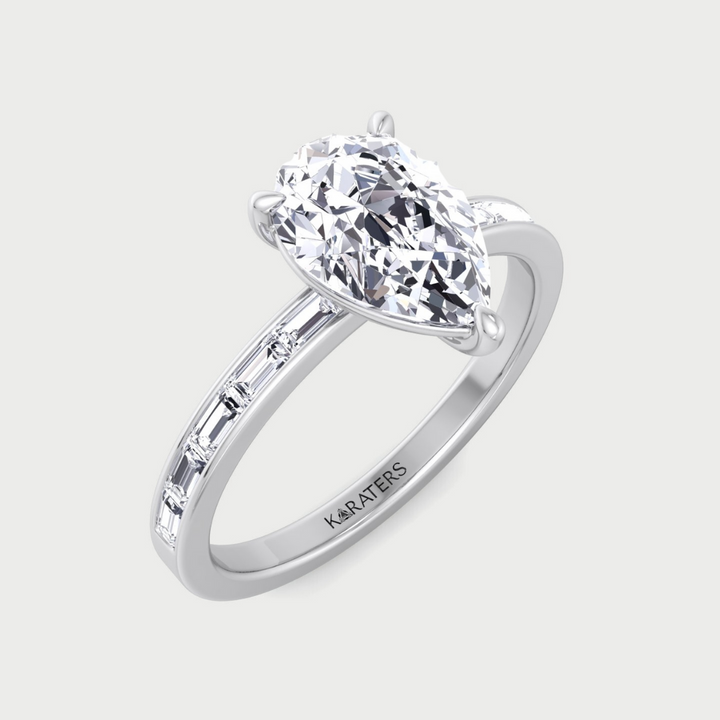 Pear Shape Lab Grown Engagement Ring with Channel Set Baguette Shape Side Stones