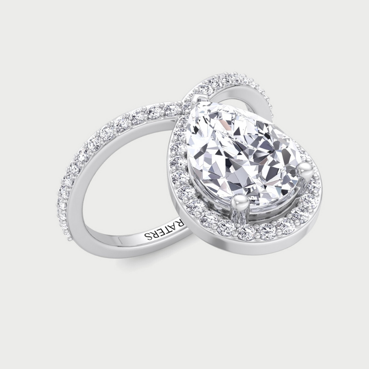 Pear Shaped Cut Lab Grown Diamond Engagement Ring With Halo and Twisted Pave Band