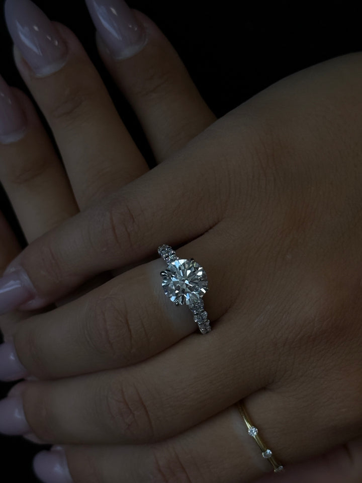 Round Shape Lab Grown Diamond Engagement Ring with Graduated Sidestones Lifestyle 1