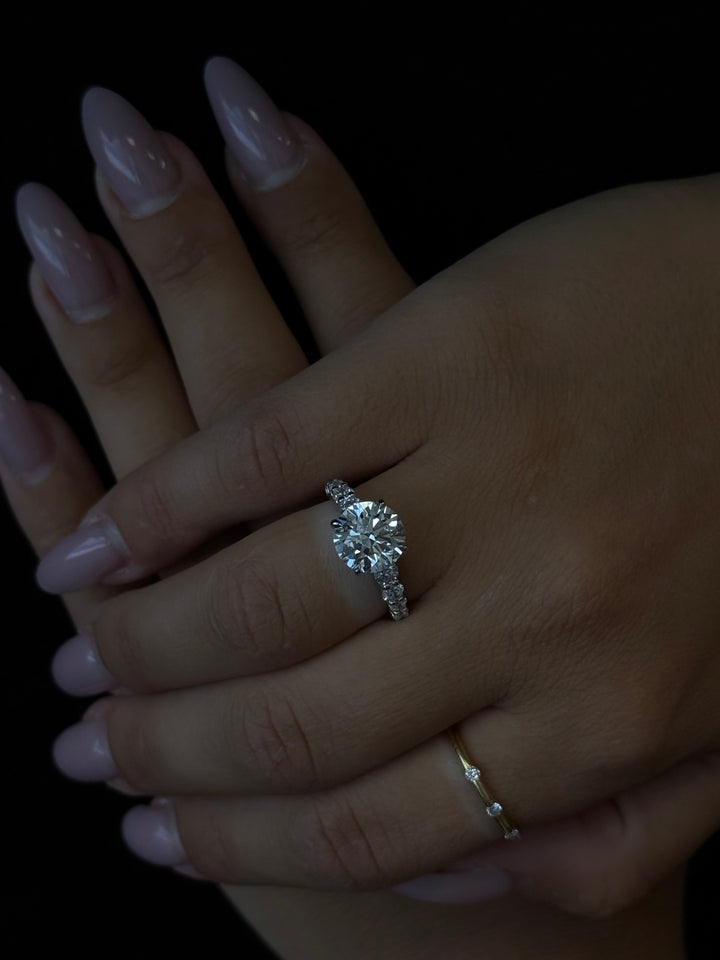 Round Shape Lab Grown Diamond Engagement Ring with Graduated Sidestones Lifestyle 2