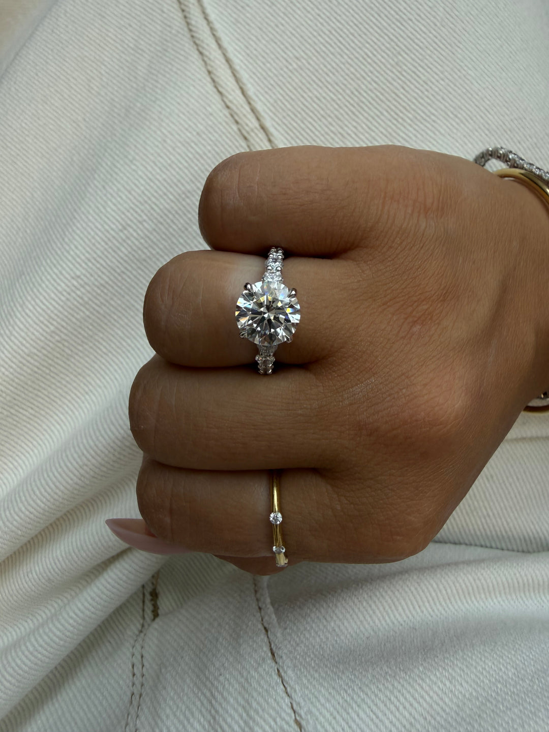 Round Shape Lab Grown Diamond Engagement Ring with Graduated Sidestones Lifestyle 3