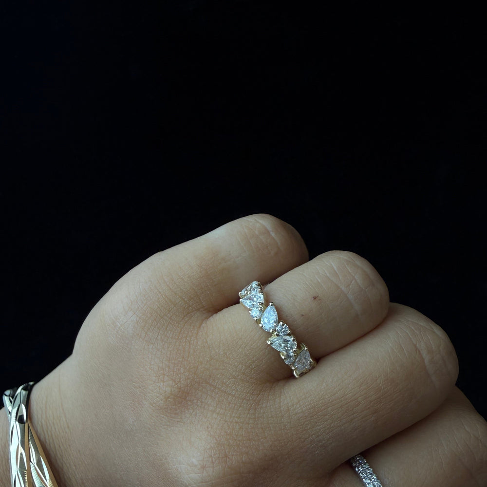 Pear and Round Shape Lab Grown Diamond Eternity Band Yellow Gold Lifestyle