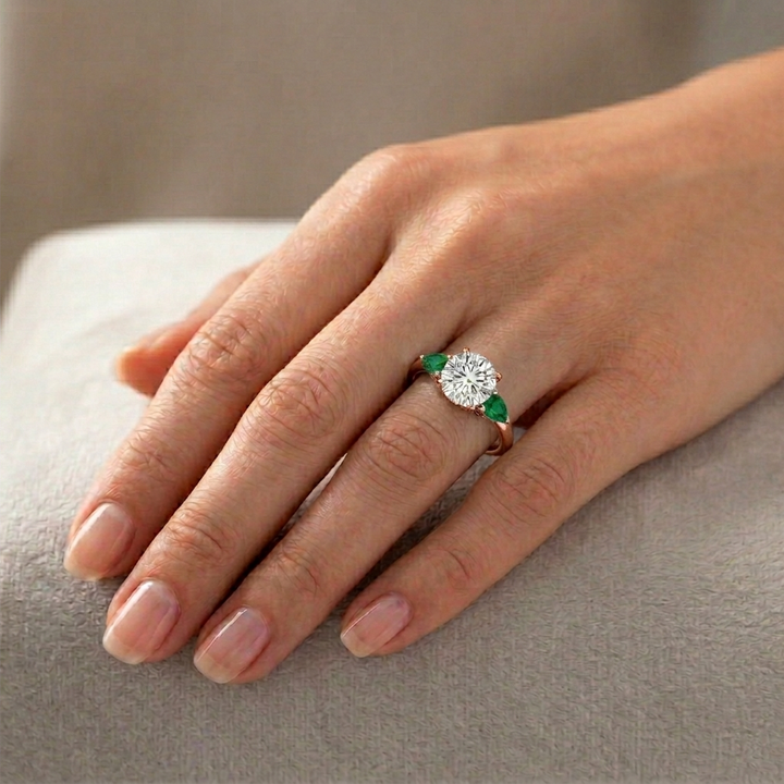 Round Lab Grown Diamond with Pear Shape Green Emerald Side Stone Engagement Ring