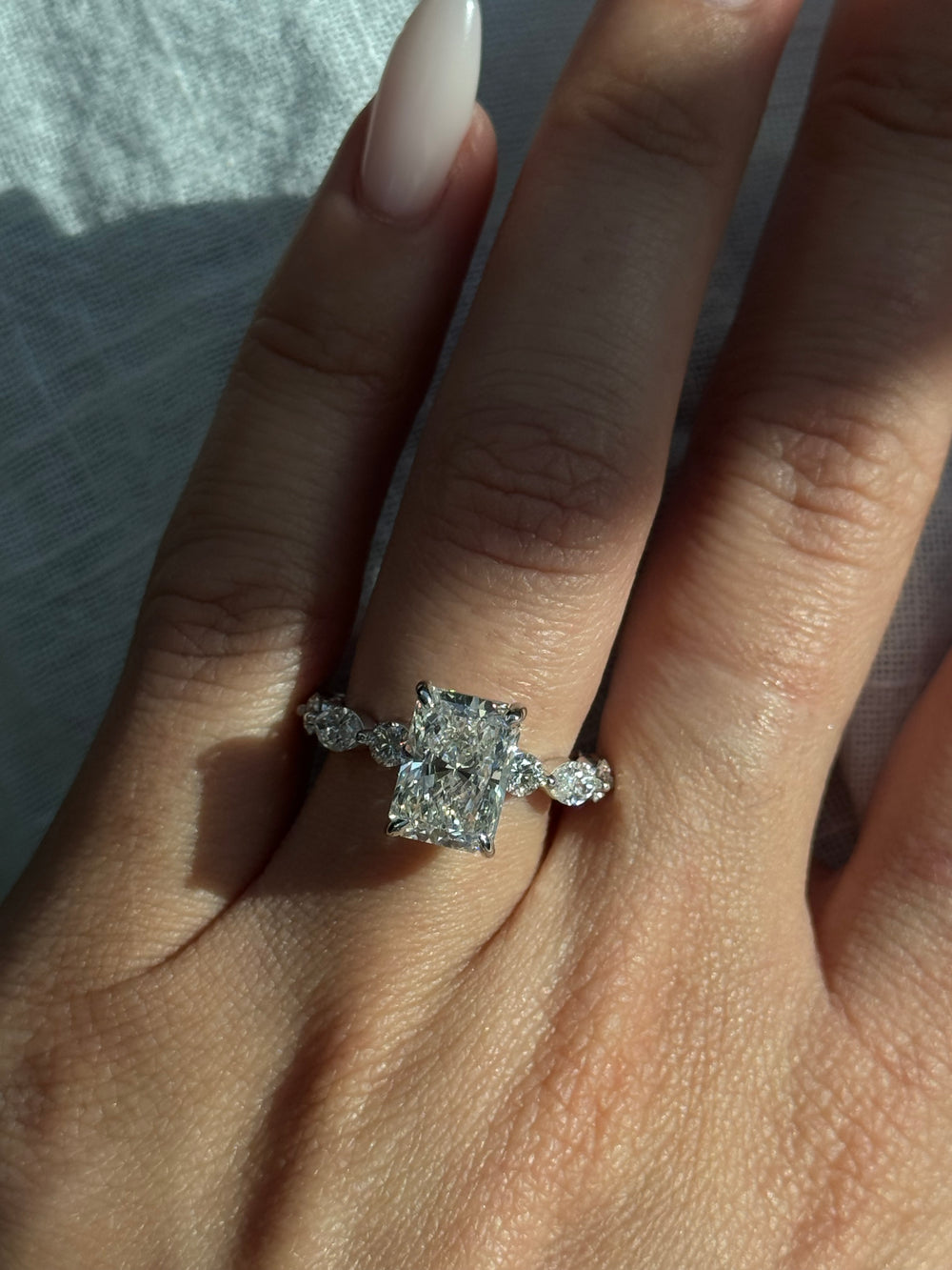 Radiant Lab Diamond Ring Hidden Halo & Round Side Stones
