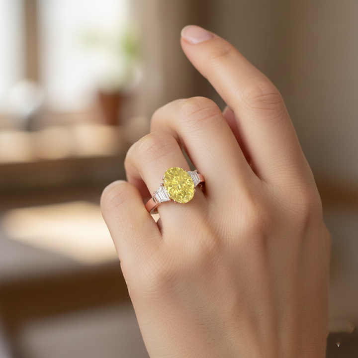 Yellow Oval Lab Grown Diamond with Trapizoid Side Stone Engagement Ring Rose Gold lifestyle