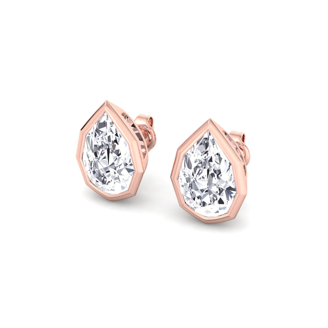 RG Pear-Shaped Lab Grown Diamond Studs in a Geometric-Style Bezel Setting slant