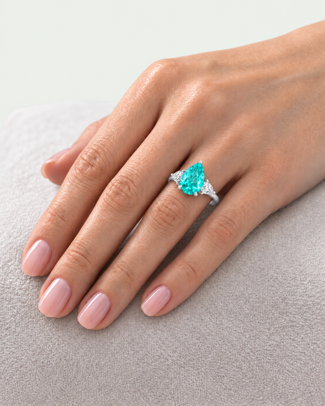 Pear Shape Paraiba Tourmaline Lab Grown Diamond Engagement Ring with Pear Sidestones lifestyle white