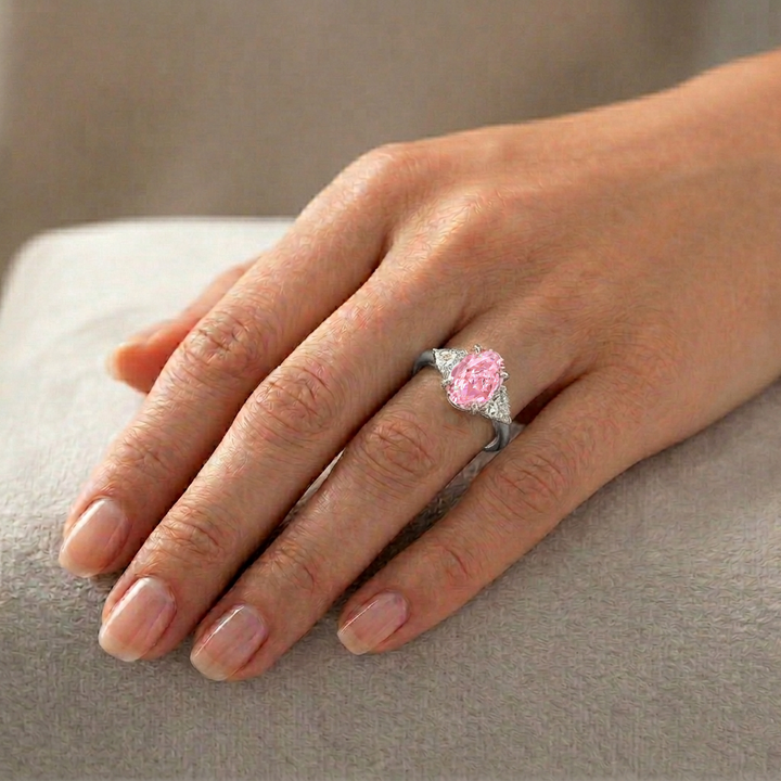 Fancy Pink Oval Shape Lab Grown Diamond Engagement Ring with Trillion Sidestone