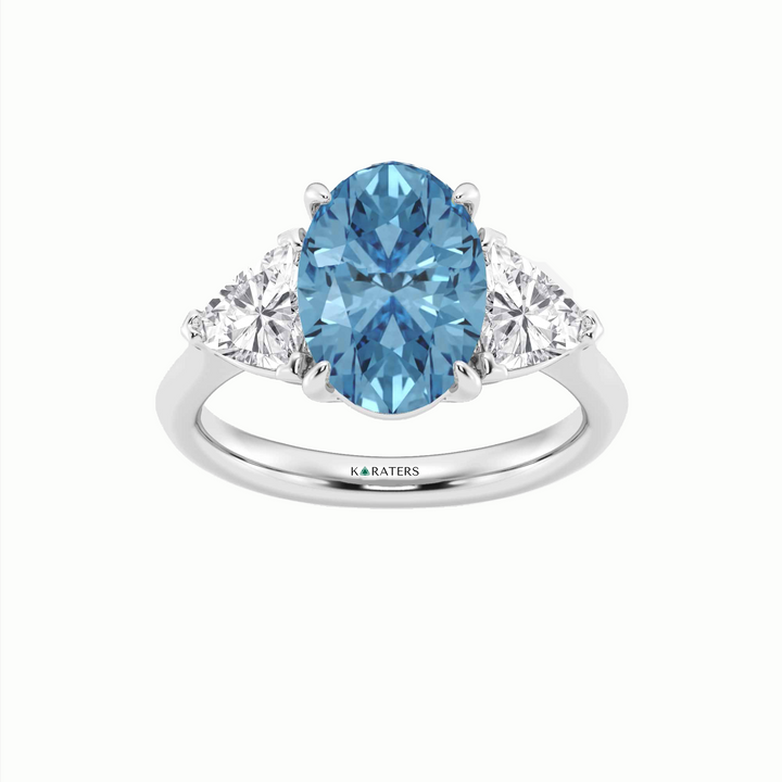 Fancy Blue Oval Shape Lab Grown Diamond Engagement Ring with Trillion Sidestones White Gold 18K