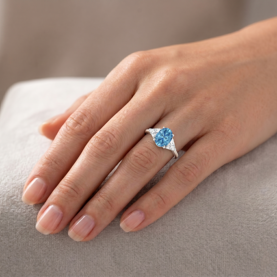 Fancy Blue Oval Shape Lab Grown Diamond Engagement Ring with Trillion Sidestones White