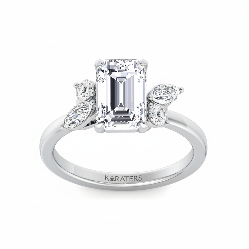 White Gold Emerald with Marquise and Round stone front angle