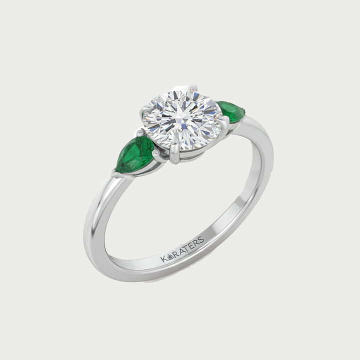 White Gold Round Lab Diamond with Pear Shape Emerald Side Stone 
