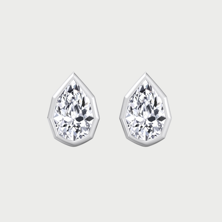 WG Pear-Shaped Lab Grown Diamond Studs in a Geometric-Style Bezel Setting