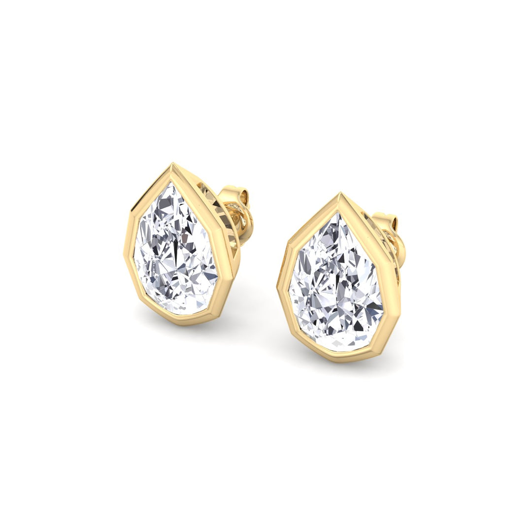 YG Pear-Shaped Lab Grown Diamond Studs in a Geometric-Style Bezel Setting slant