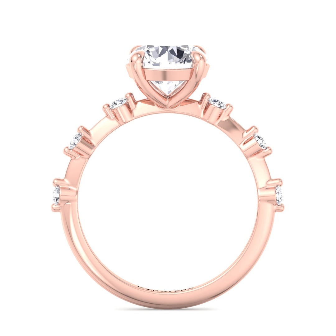 round-cut-solitaire-lab-grown-diamond-engagement-ring-with-sidestones-in-rose-gold