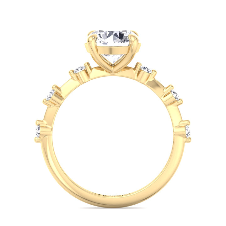 round-cut-solitaire-lab-grown-diamond-engagement-ring-with-sidestones-in-yellow-gold